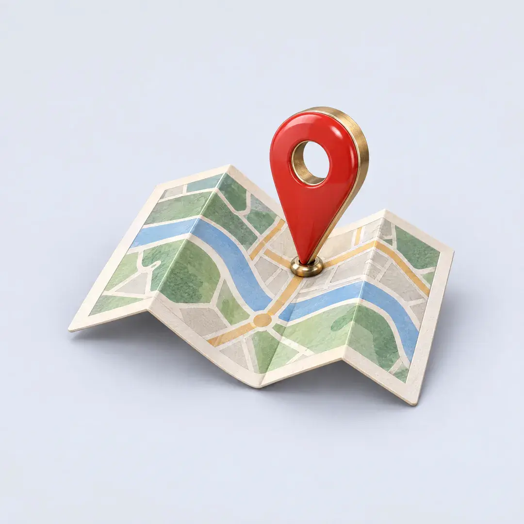 Icon of a folded paper map with a red enamel map pin